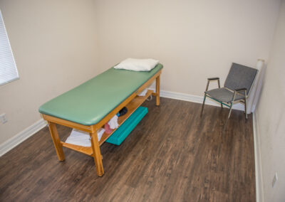 physical therapy private exam room with table