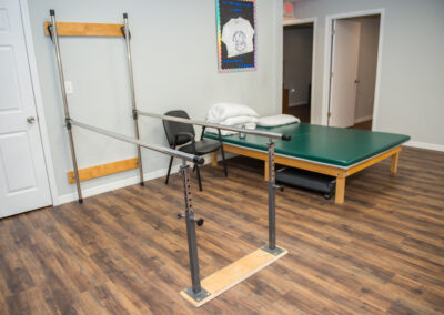 Physical Therapy in Bradenton Balance Bars and treatment table in gym area