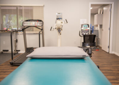 Physical Therapy clinic in bradenton with UBE, treadmill and recumbent bike