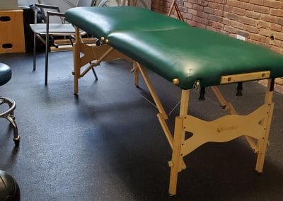 Treatment table in a physical therapy clinic located 1705 Osprey Avenue Sarasota, Florida