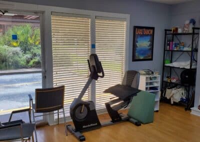 Physical Therapy clinic treatment area with recumbent bike located at 1705 Osprey Avenue Sarasota Florida