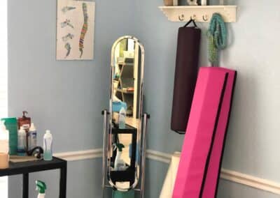 Physical Therapy open treatment area with table and therapy equipment
