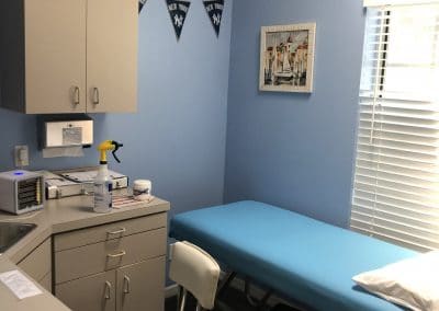 Physical Therapy treatment room Punta Gorda Florida treatment table and cabinets