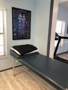 Physical Therapy treatment area Punta Gorda Florida treatment table and anatomy picture