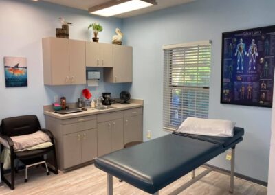 Physical Therapy clinic treatment area with treating table