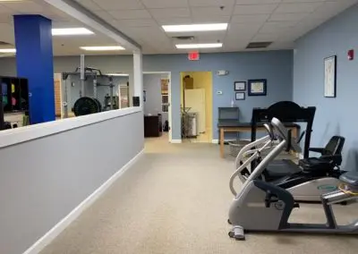 outpatient physical therapy clinic recumbant bike and cardio area